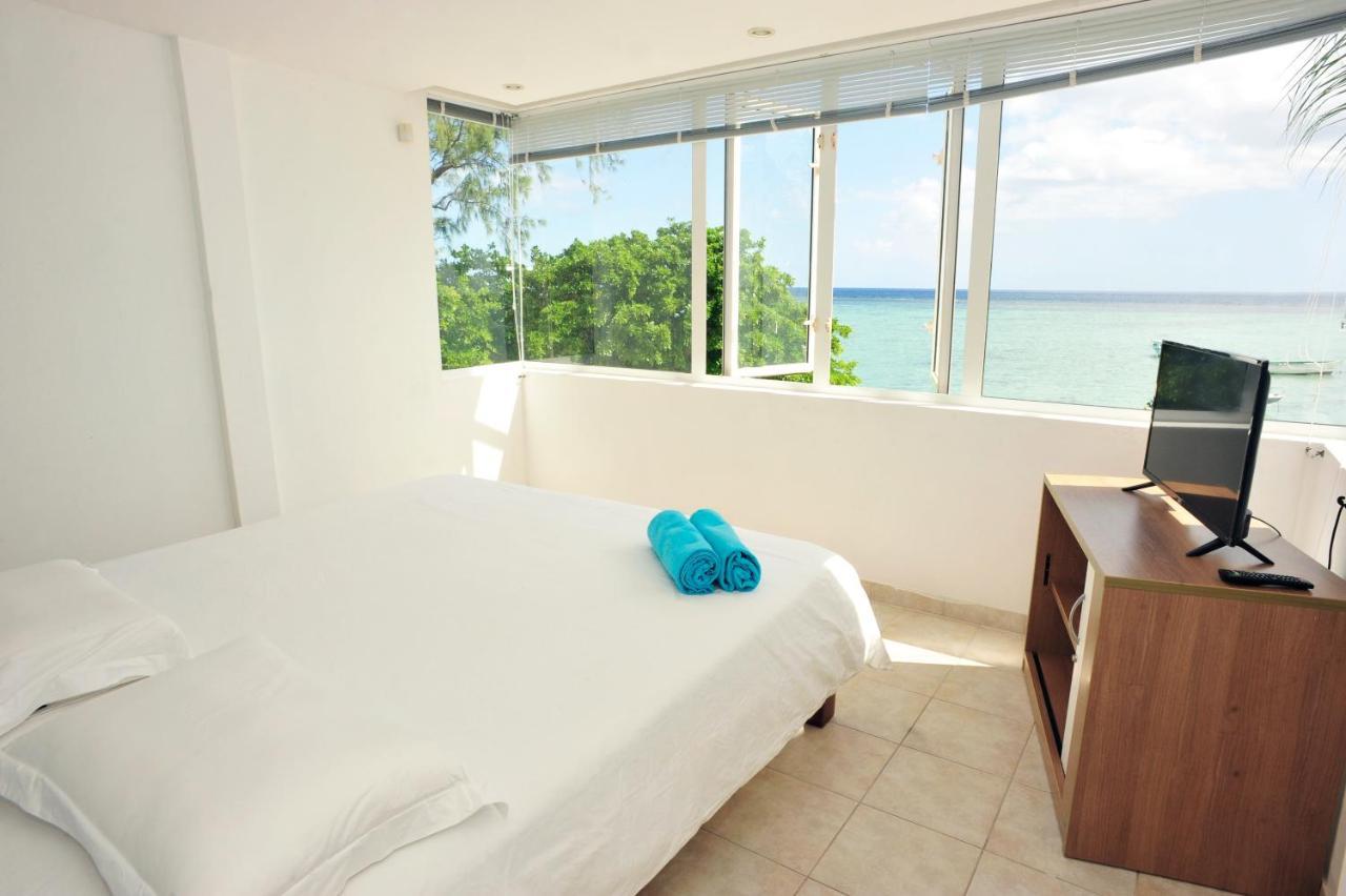 The Beach House - West Coast Mauritius Riviere Noire Bagian luar foto